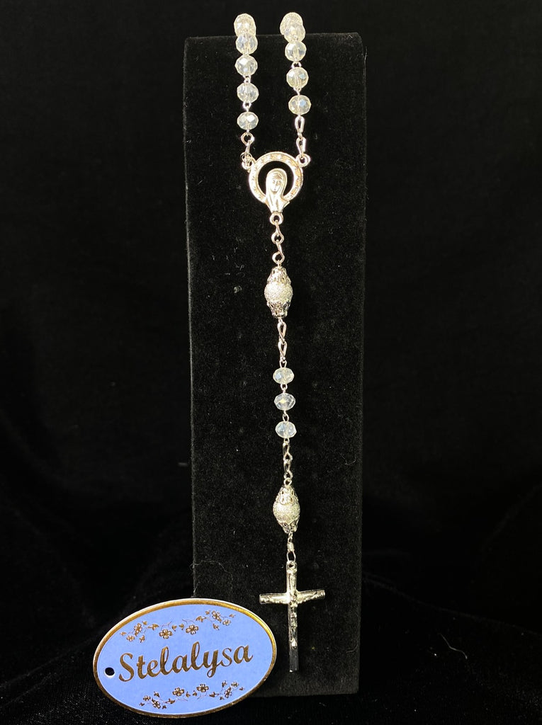 Rosaries are a very special symbol and prayer guide.    Silver rosary with beads.  A must have for the First Communion or to be given as a special gift for any occasion.  A rosary is included in the Bible Set.  However, you can also purchase it on its own if needed.  16 1/2 in. long.