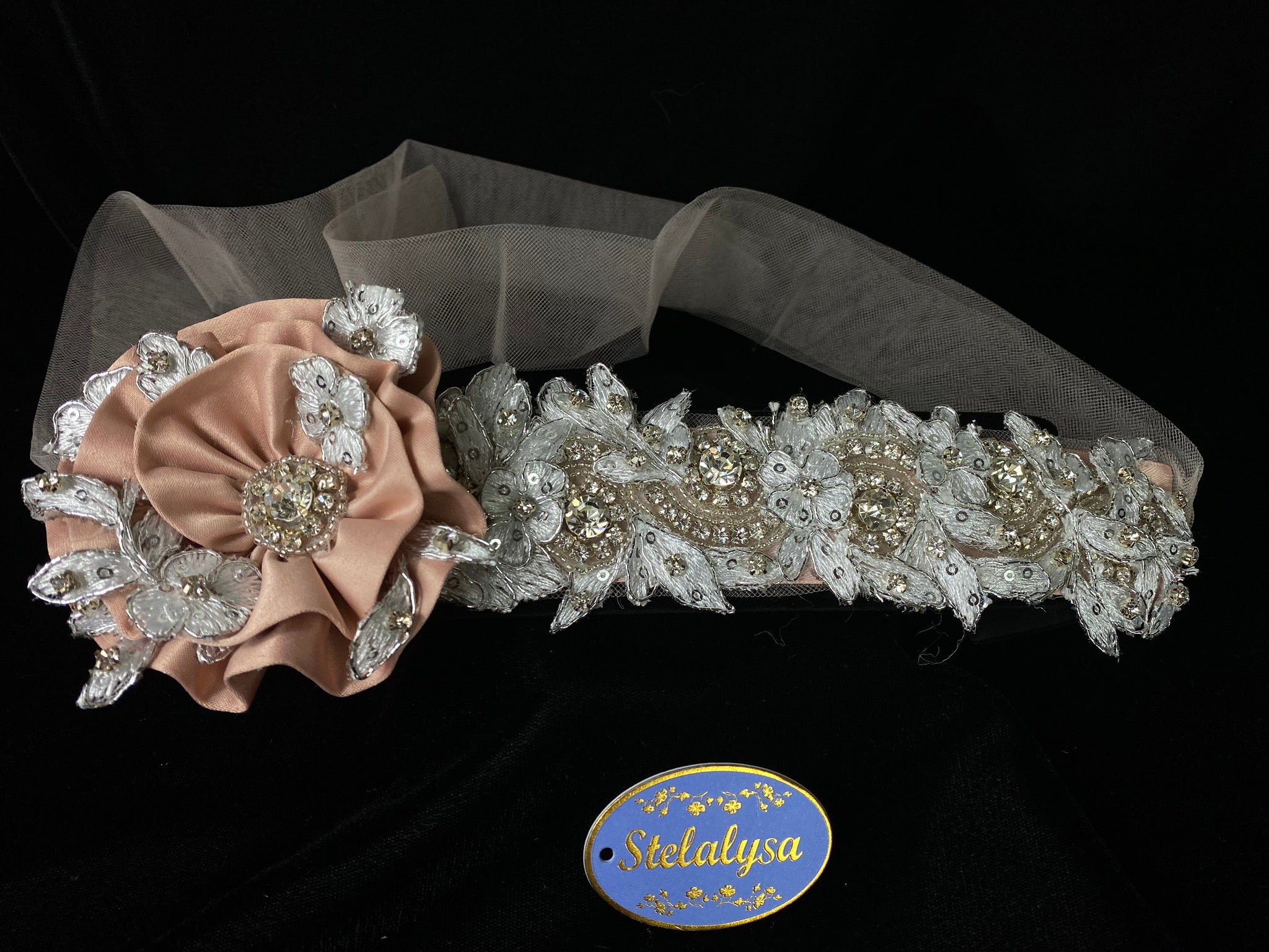 Headband with Strings - Champagne Flower and Tulle Strings  This is an elegant unique handmade and one-of-a-kind headband with a large Copper flower and Champaign long tulle strings attached.  The large flower is uniquely decorated with rhinestones, beads, and hand stitched flowers. The soft headband is made with elegant flowers with sequins, silver sequins, and rhinestones.  
