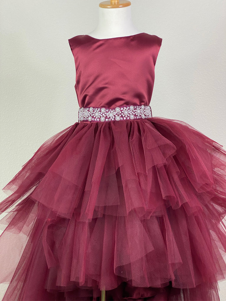 BURGUNDY  Burgundy satin bodice Pearl embellished belt going from front to back Layered burgundy tulle skirting over burgundy satin Zipper closure Dress pictured with a petticoat Petticoat not included  Choose from a tulle, cloth, or wire for best look