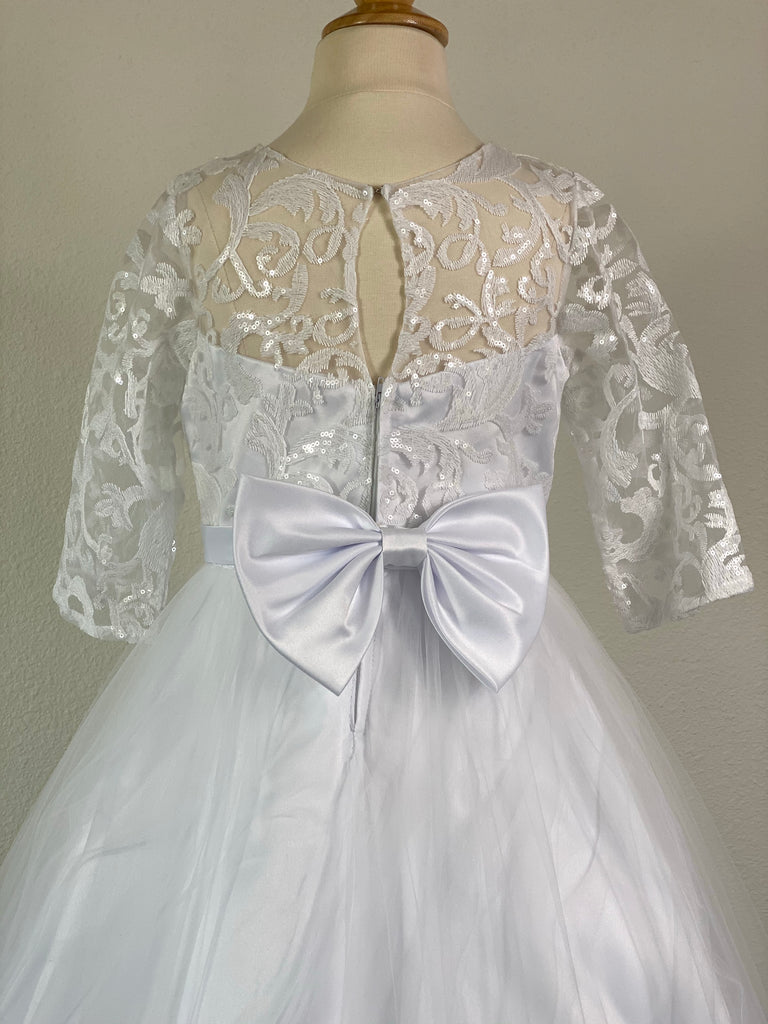 White, size 10 Laced illusion bodice with scoop neck with sequins Lace quarter sleeve Thin satin belt band Satin skirt with tulle overlay and lace edging  Elegant short train showcasing the lace edging Zipper closure Elegant big bow detail