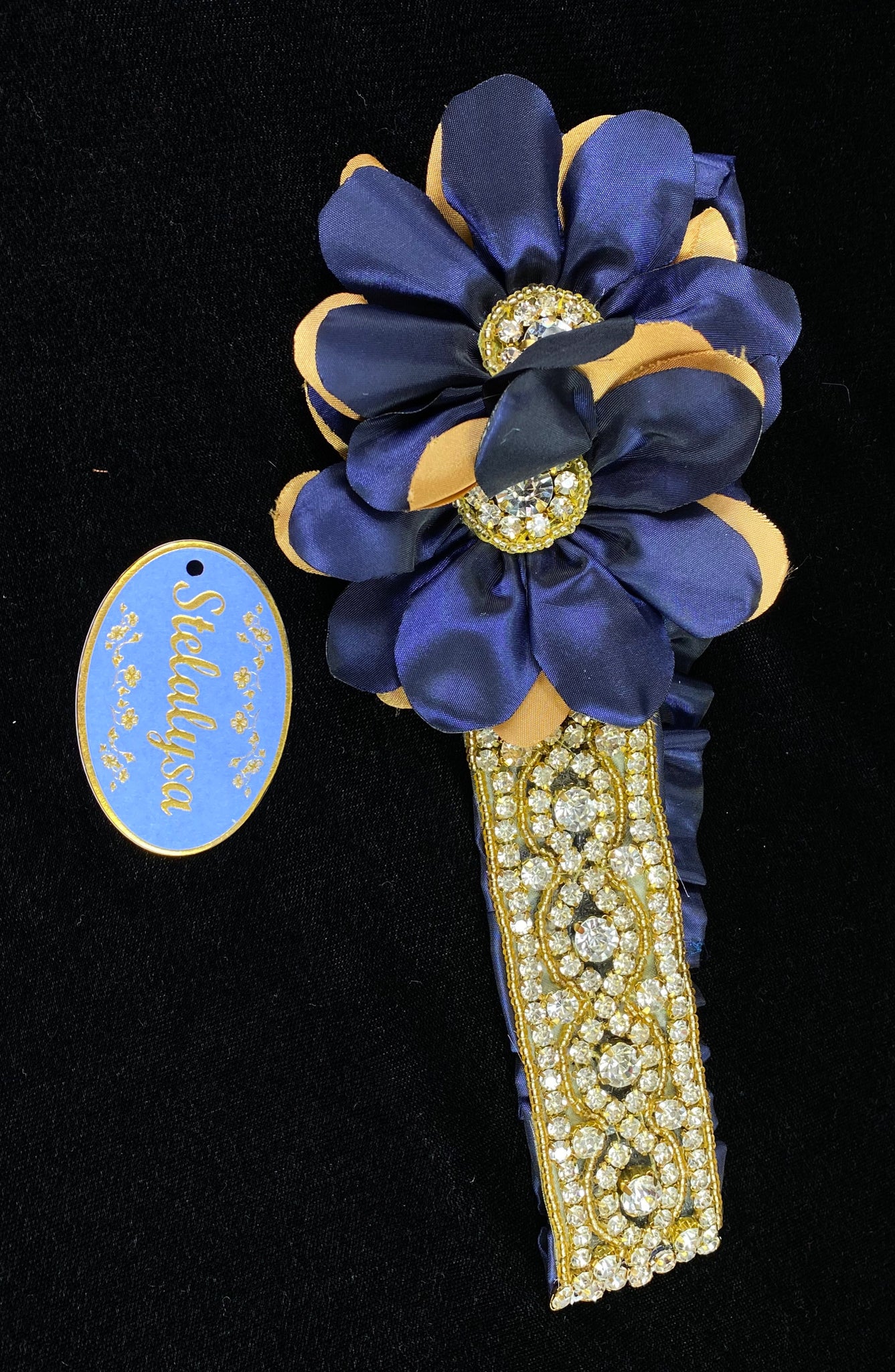 This is a gorgeous elegant handmade and one-of-a-kind elastic headwrap.  Large flowers are navy and gold.  Headwrap is beautifully made with rhinestones and gold beads.   This headwrap would be perfect with dresses from the Stelalysa Celebration/Pageant Collection.