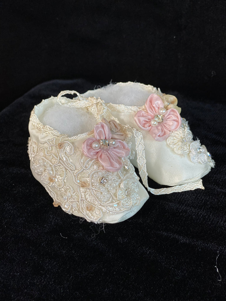 Elegant handmade ivory / white baby girl ankle boots with embroidery, lace, flowers, and jewels (pearls and crystals) with side string closure.