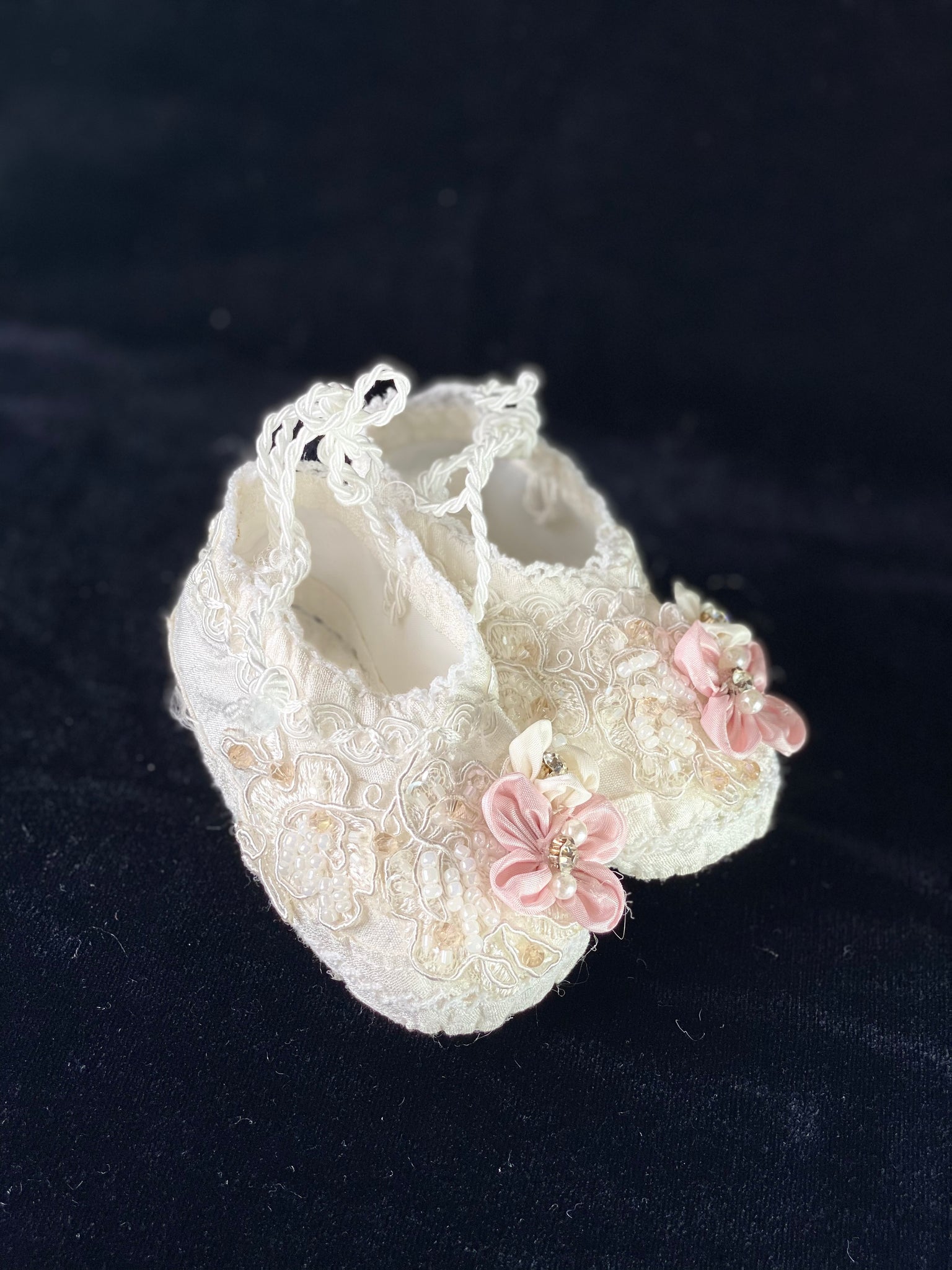 Elegant handmade ivory / white baby girl shoes with embroidery, lace, flowers, bows, and jewels (pearls and crystals).