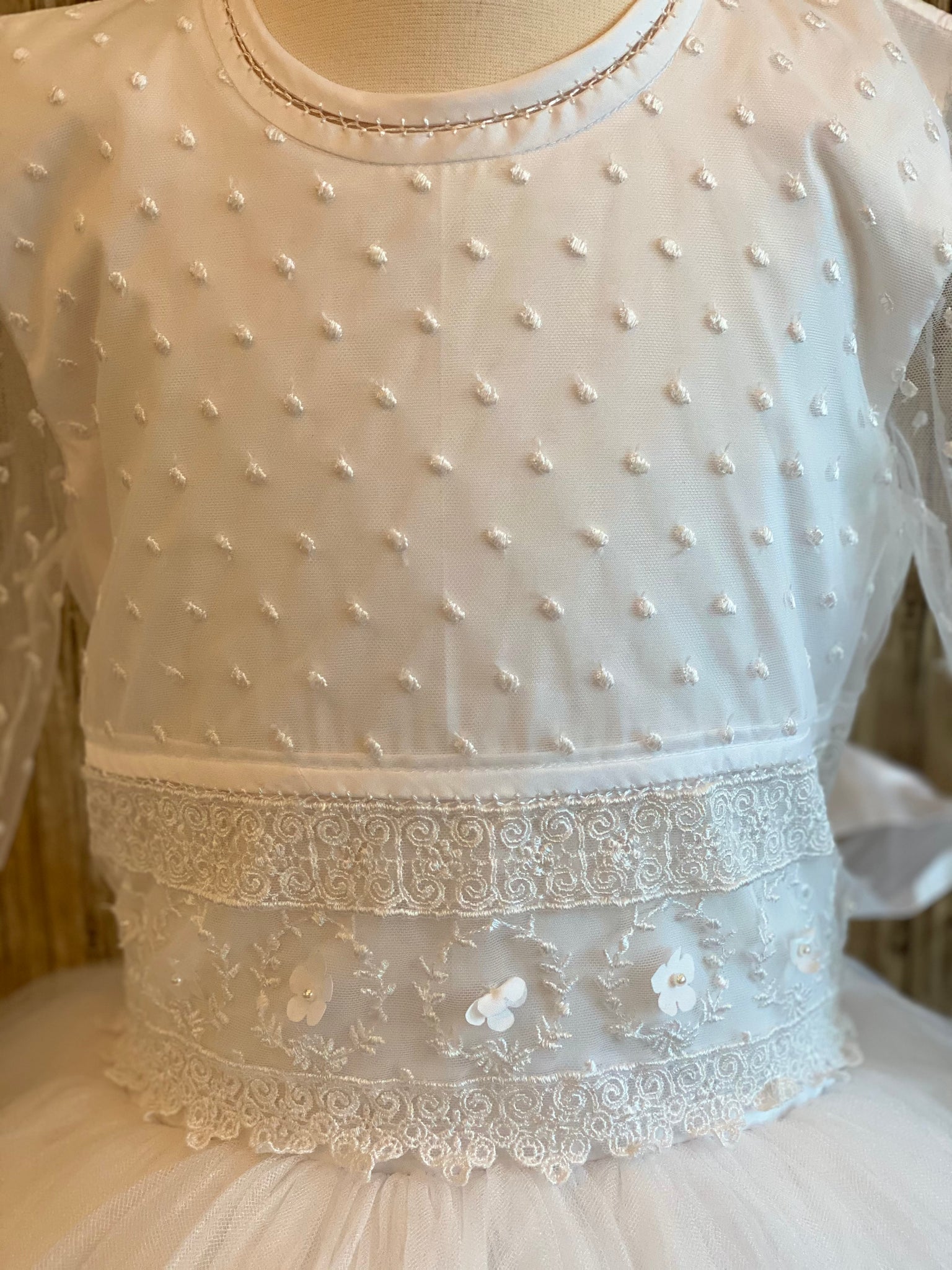 Size 10 and 12 Dotted lace bodice Full sleeve with matching dotted lace with wide flower band on wrist Wide floral and lace paneling on lower/waist  bodice Tulle skirt Back button closure  Satin ribbon for bow