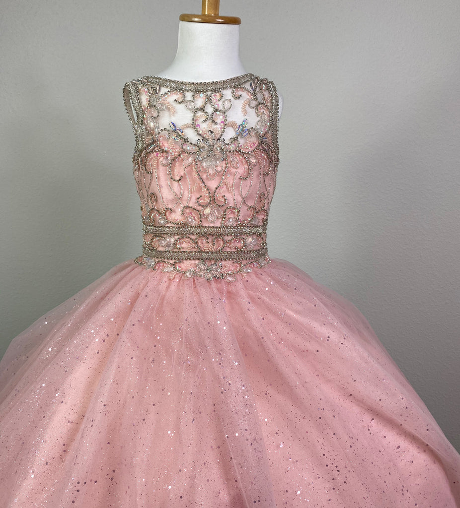 Pink, size 4 Satin illusion bodice Bedazzled rhinestone tulle over bodice Crystal gems along bodice Glittered pink tulle over pink satin skirting Corset back Dress pictured with a petticoat Petticoat not included  Choose from a tulle, cloth, or wire for best look