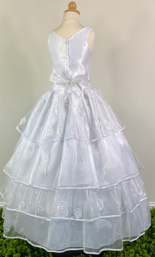 White, size 8 Satin bodice Scoop Neckline Pearl and Diamond Twisted Belt Detailing Four Layered Tulle over Satin Dress with swirl design Button closure in back Mesh ribbon for bow