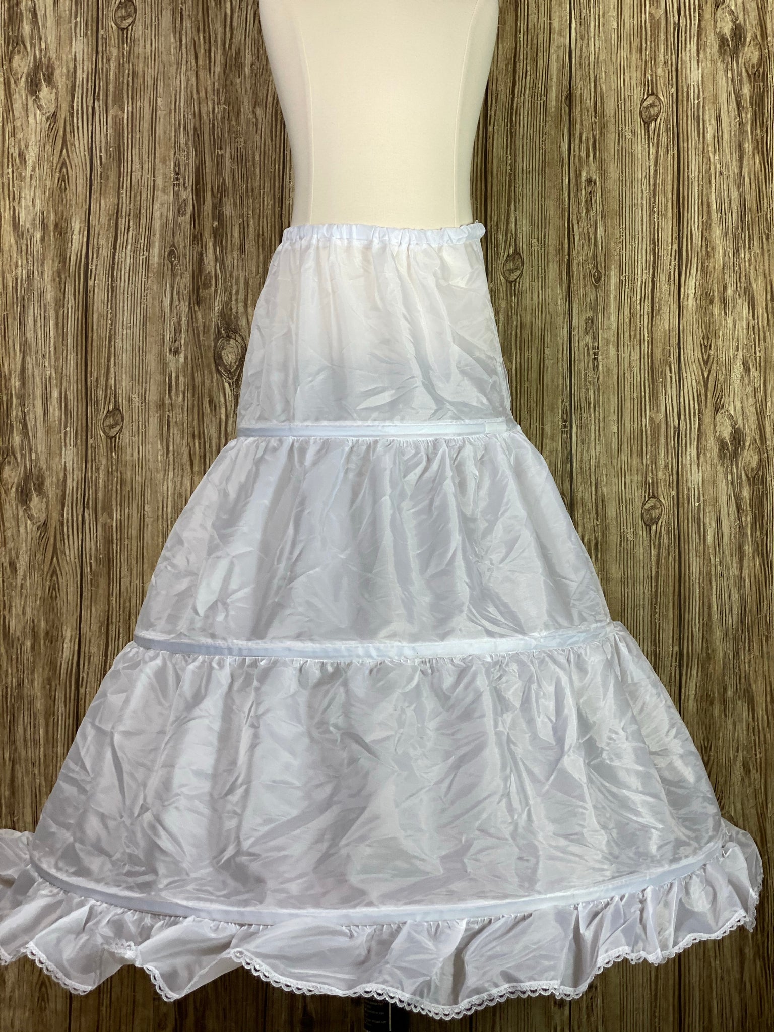 3 hoop crinoline cloth petticoat Lace trim 3 sizes Small- 26.5in diameter, 19in tall (Age 3-6) Medium- 31 diameter, 23in tall (Age 8-12) Large- 36 diameter, 30in tall (Age 14-16) Elastic wait band