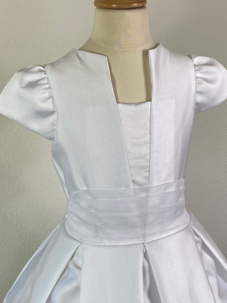 Paneled V-neck bodice Gathered Satin Sleeve Ribbed Tulle belt Pleated Satin Skirt Pearl button closure Tulle Ribbon for bow