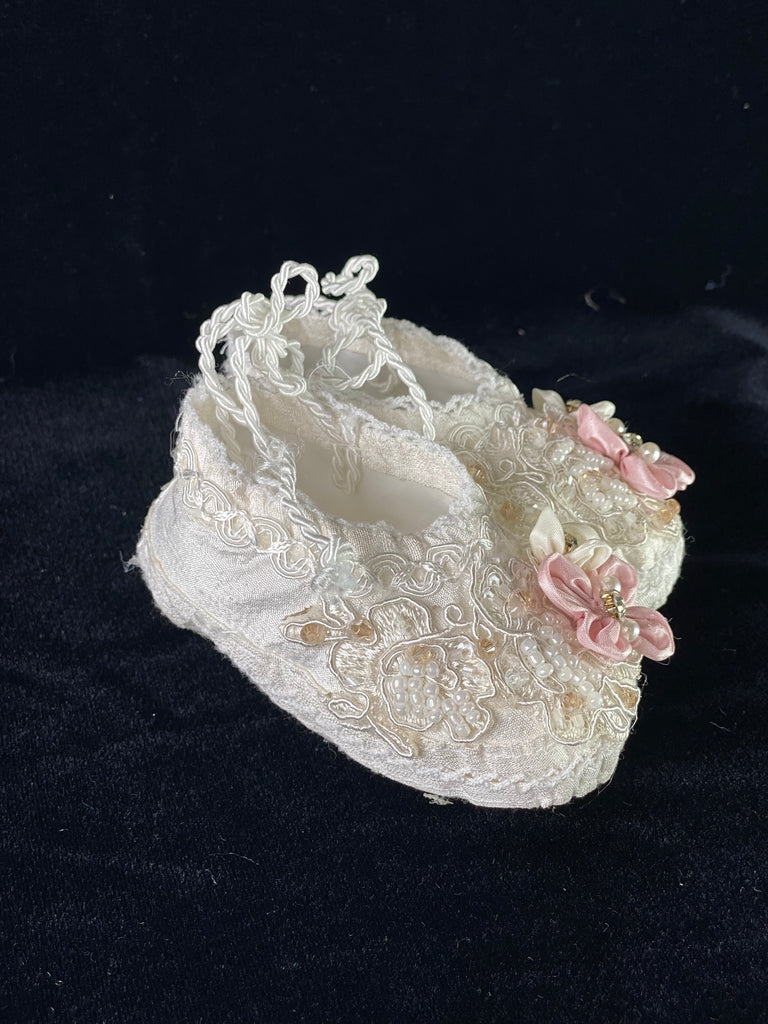 Elegant handmade ivory / white baby girl shoes with embroidery, lace, flowers, bows, and jewels (pearls and crystals).