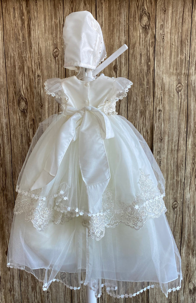 This a beautiful, one-of-a-kind baptism gown.  A lovely gown for a precious child.  Dress Ivory, size 6M  Satin bodice with embroidered floral overlay Tulle half sleeve with flower edge Rhinestone flowers with pearl center belting Tulle skirting with embroidered scalloped edge Slip  Satin bodice Simple tulle skirting with flower edge Bonnet  Satin embroidered bonnet  Flowers along mesh brim