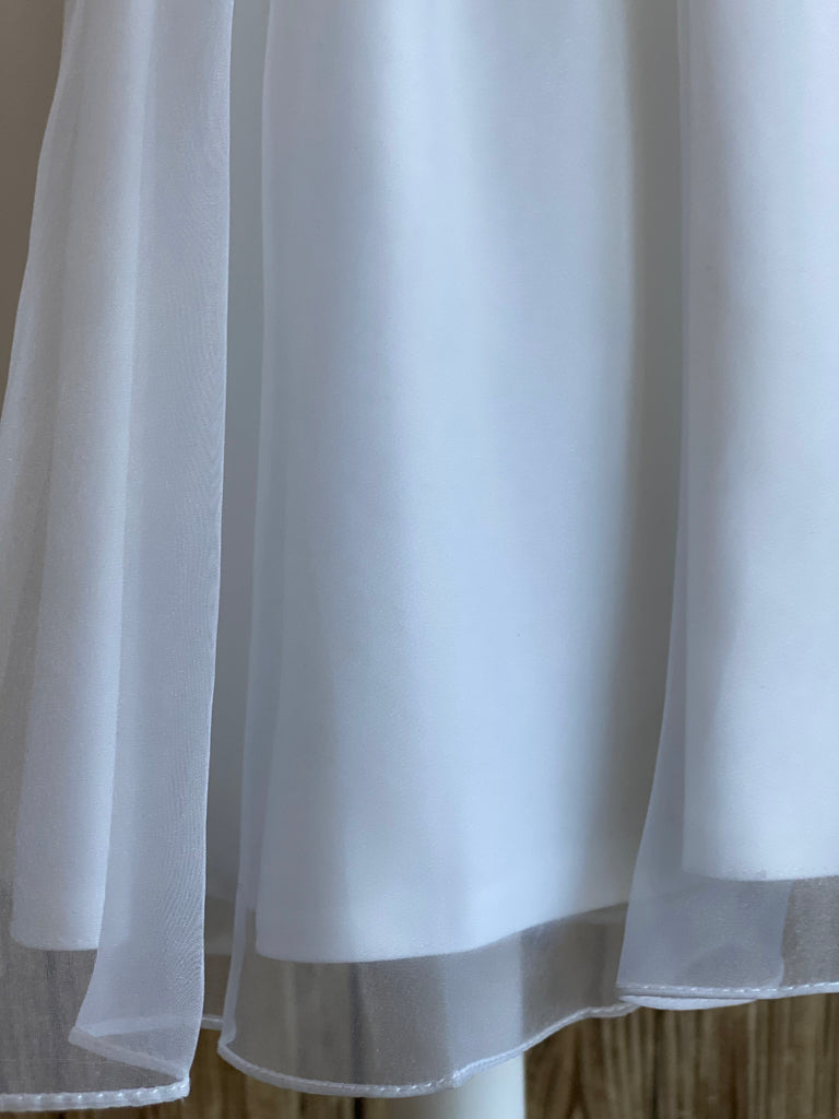 This a beautiful, one-of-a-kind baptism gown.  A lovely gown for a precious child.  White, size 24M Short sleeve Satin bodice with beaded detailing along bottom Satin skirting with mesh overlay Zipper closure