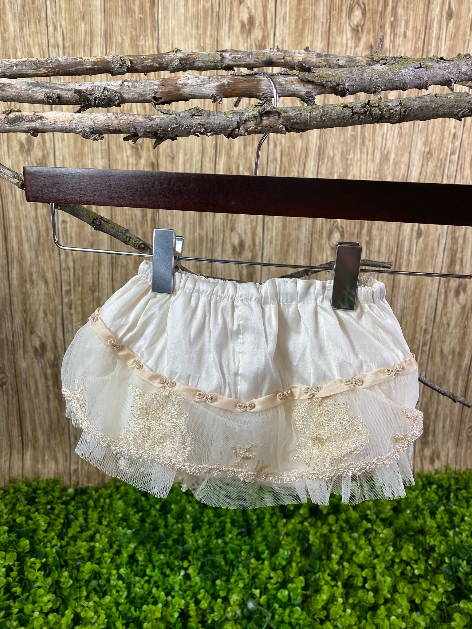 Bloomers with Embroidered Tulle - Ivory  These ivory bloomers are exclusive to Stelalysa!  They are handmade and one of a kind.  The ruffle design in the backside is made of tulle, satin ribbon and embroidered lace making it a gorgeous piece.   One size fits 3 to 12 month old babies.   