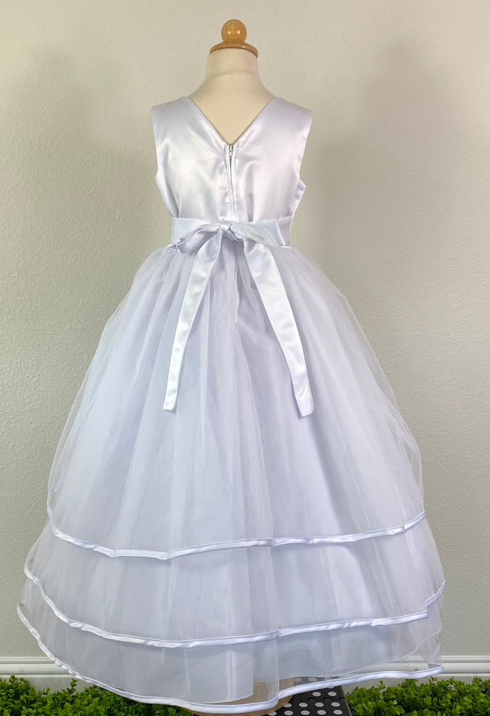 White, size 10 Wrapped Ribbed Bodice Small floral bouquet detailing on lower bodice Gathered mesh cape skirt lined in satin Zipper Closure Satin Ribbon for bow