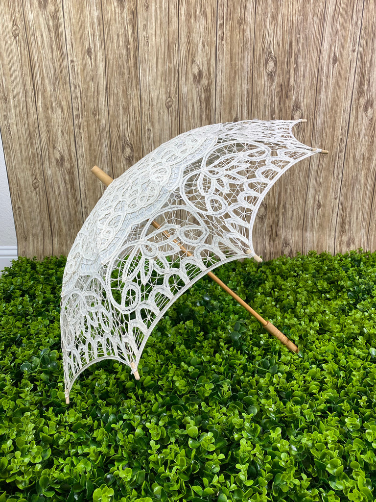 Ivory crochet umbrella Wooden handle Easy open and closure 100in around 37.7in diameter 26.5in tall Perfect for girls ages 8-14