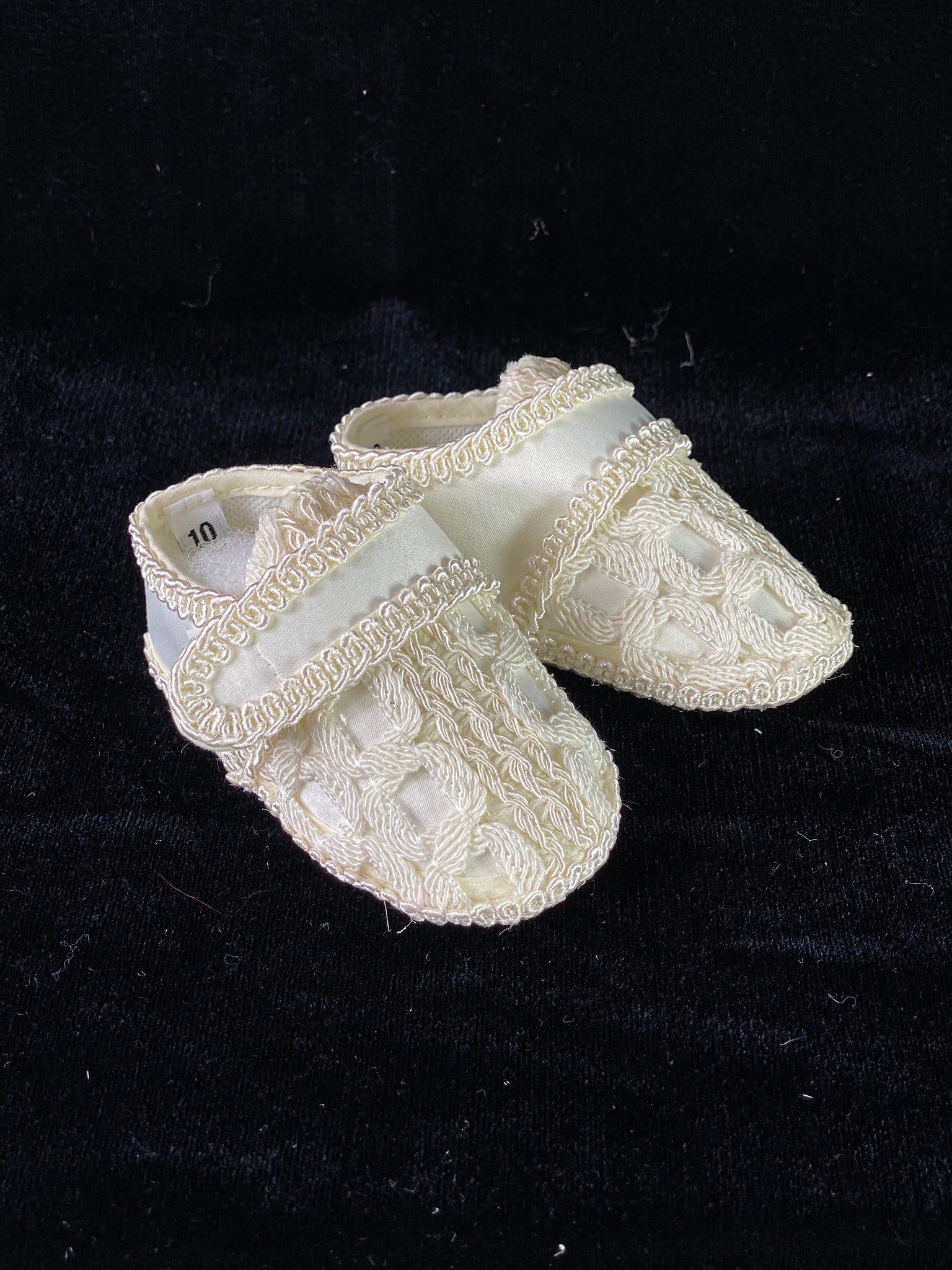 Elegant handmade English style ankle boots in ivory with  embroidery and Velcro closure.