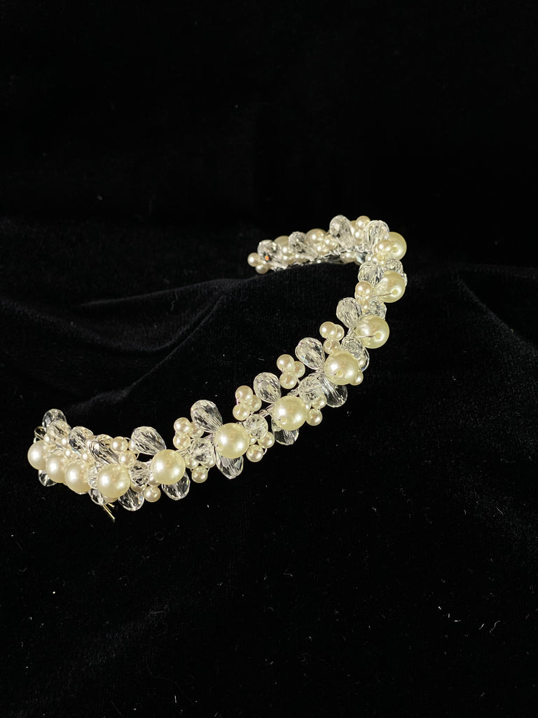  A must have for the First Communion!   Beautiful headband applique with pearl and crystal detailing.  Headband is 12" long, to sit beautifully around the head.  This headband will adorn a Stelalysa veil!  Wear with either a white or ivory First Communion dress!