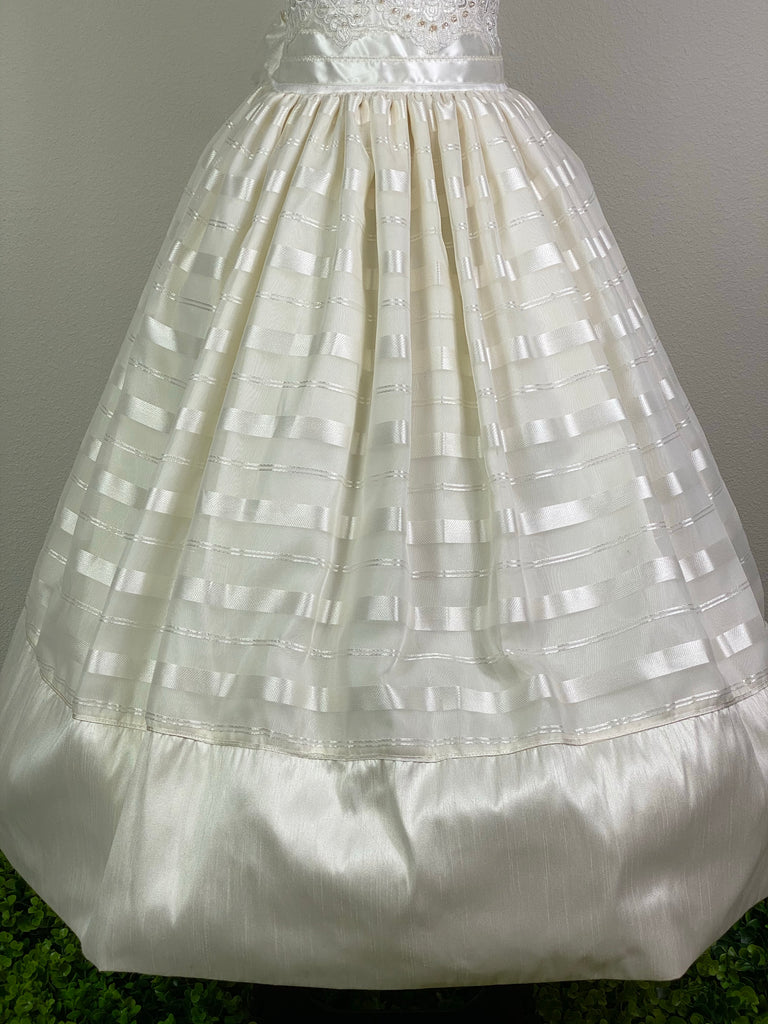 Ivory, size 8 Embroidered ivory scalloped cap sleeve Ivory scalloped scoop neck Jeweled Embroidered ivory satin bodice Wide ivory satin ribbon cummerbund Ivory horizontal striped tulle skirt Button closure Ivory satin ribbon for large bow