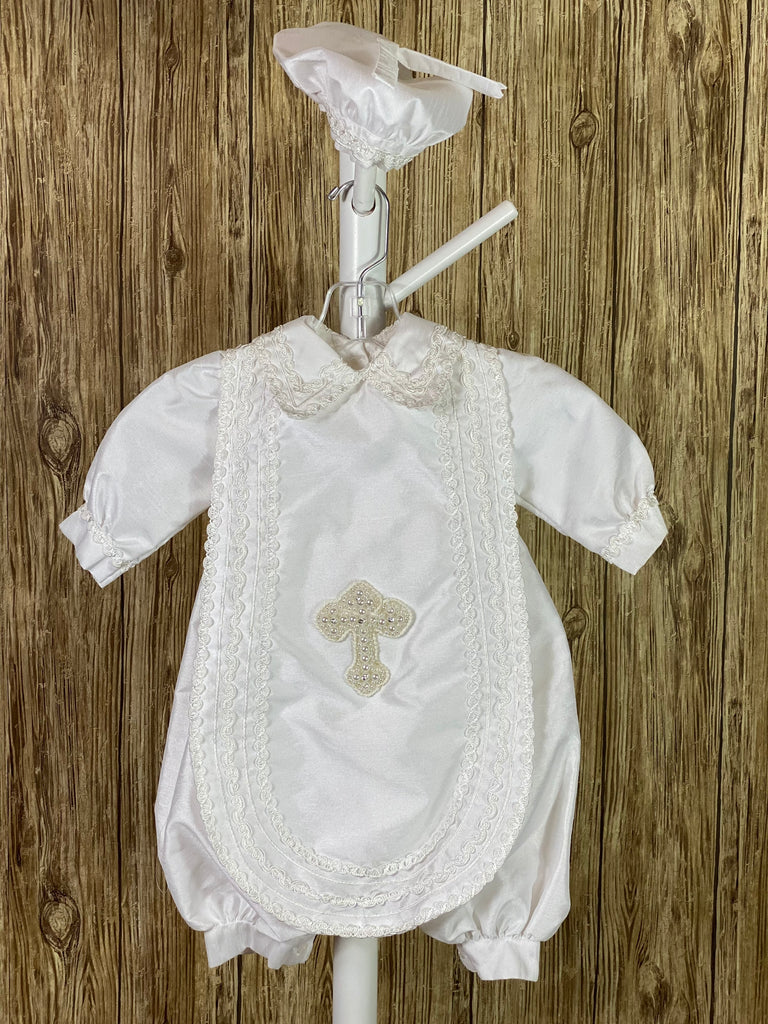 WHITE  3-piece white set including beret, one piece stole, romper Collared shirt with long sleeves Buttoning on pant cuffs Button closure on back of romper Wide embroidered trim along edge of stole and collar Thin embroidered trim along sleeve cuff edge Large pearl beaded cross on front of stole