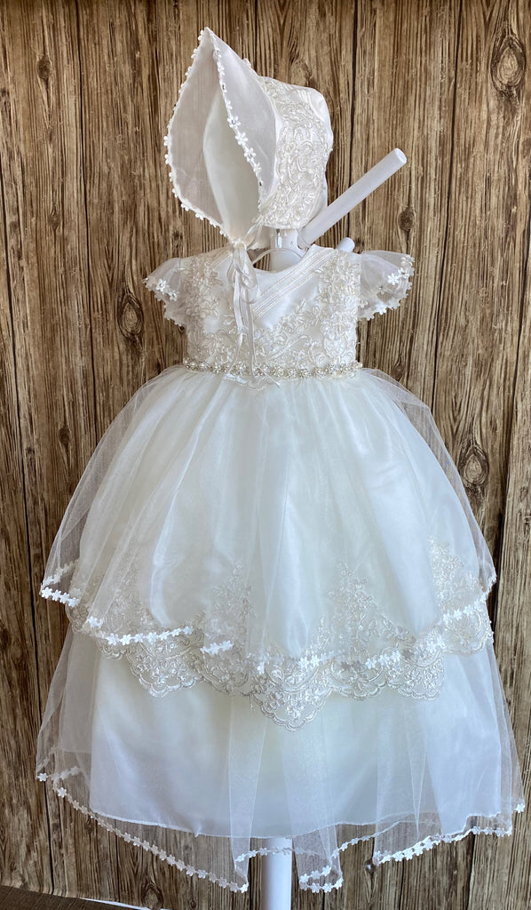 This a beautiful, one-of-a-kind baptism gown.  A lovely gown for a precious child.  Dress Ivory, size 6M  Satin bodice with embroidered floral overlay Tulle half sleeve with flower edge Rhinestone flowers with pearl center belting Tulle skirting with embroidered scalloped edge Slip  Satin bodice Simple tulle skirting with flower edge Bonnet  Satin embroidered bonnet  Flowers along mesh brim