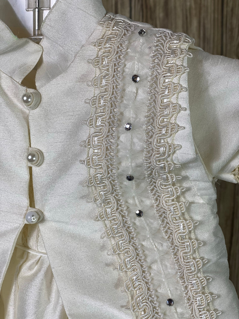 This a beautiful, one-of-a-kind boy’s baptism gown/set.  Lovely clothes for a precious child.  Ivory, size 12M Raw Silk Collared shirt with short sleeves Buttoning on pant cuffs Button closure on back of shirt Braided trim around stole Rhinestones down stole Button closure on stole