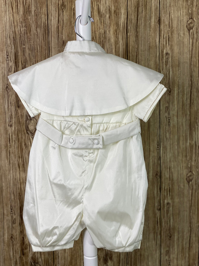 This a beautiful, one-of-a-kind boy’s baptism gown/set.  Lovely clothes for a precious child.  Ivory, size 6M  3-piece set including mozzetta, romper, and thin belt Collared romper with short sleeves Buttoning on pant cuffs Button closure on back of jumper and belt Hand stitched trim along sleeve cuffs Pin tucks diagonal on top half of jumper Embroidered leaf design on romper, belt, and mozzetta Embroidered trim along romper trim Rope closure on mozzetta